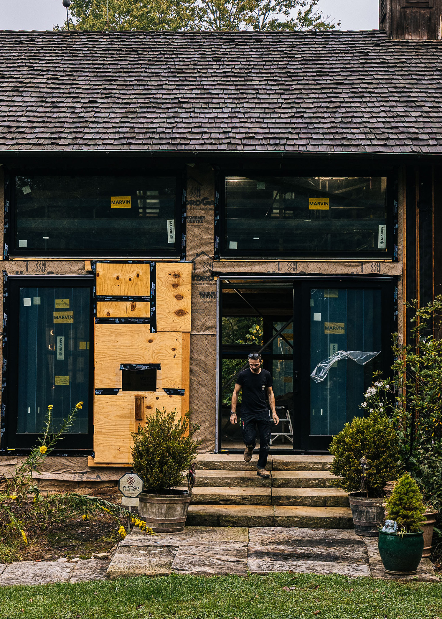 A Black Boot Builder walking out of a custom home design project.