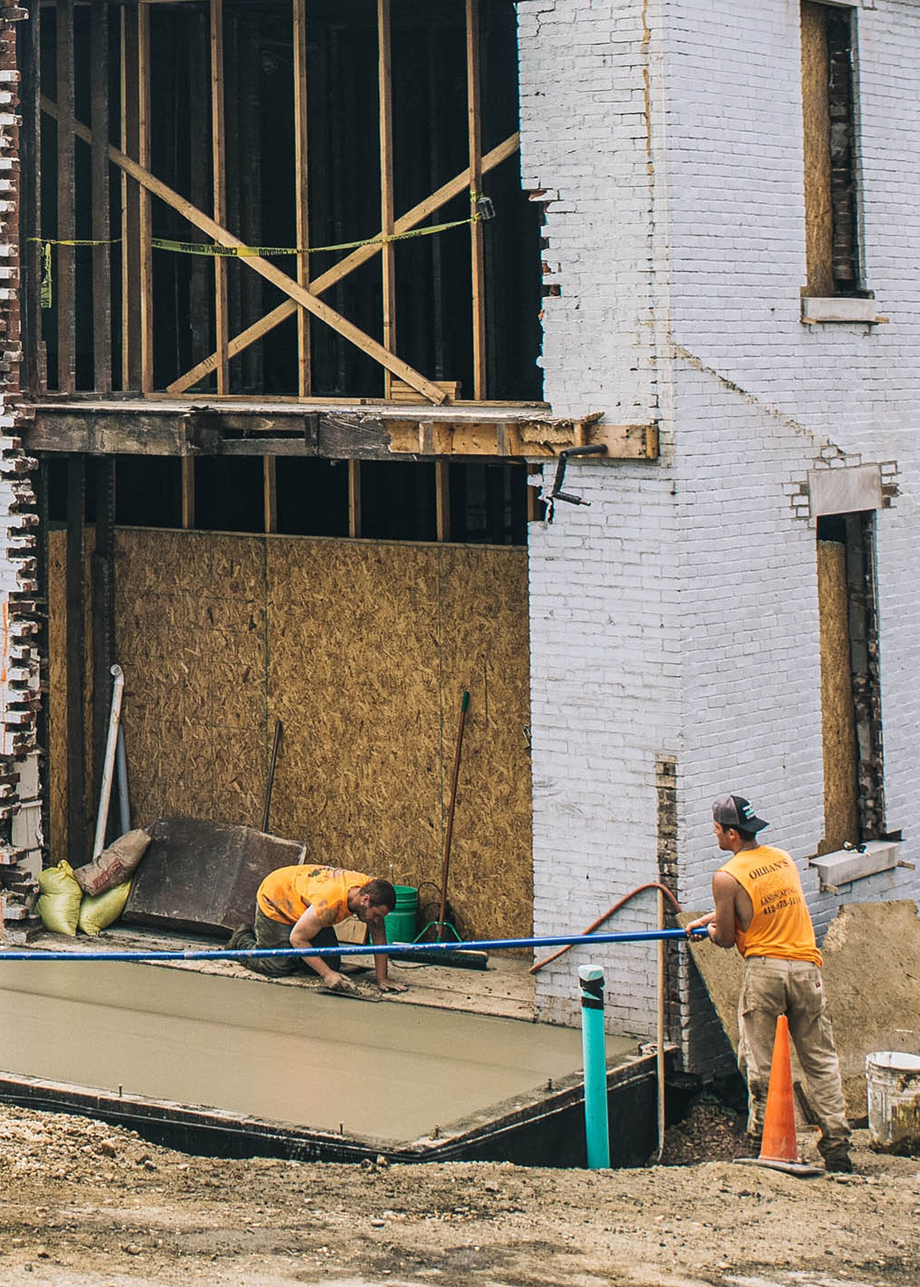 Construction workers on site doing site preparation.